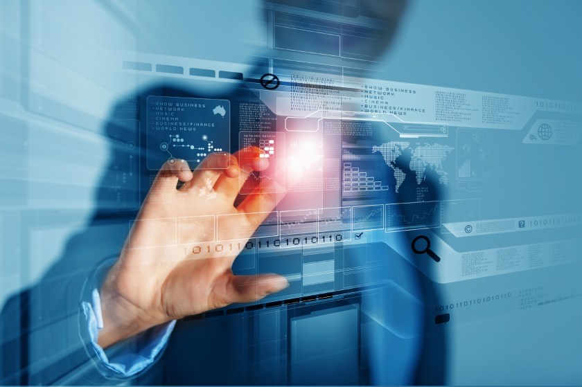 Businesswoman touching icon